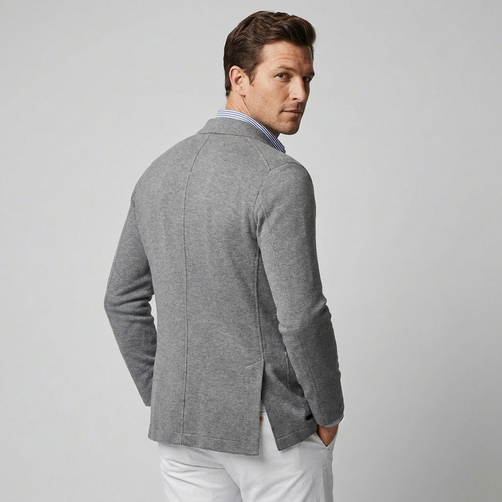 Hoogwaardige stof van een herenblazer met klepzakken, voor een comfortabele en stijlvolle bovenkleding.