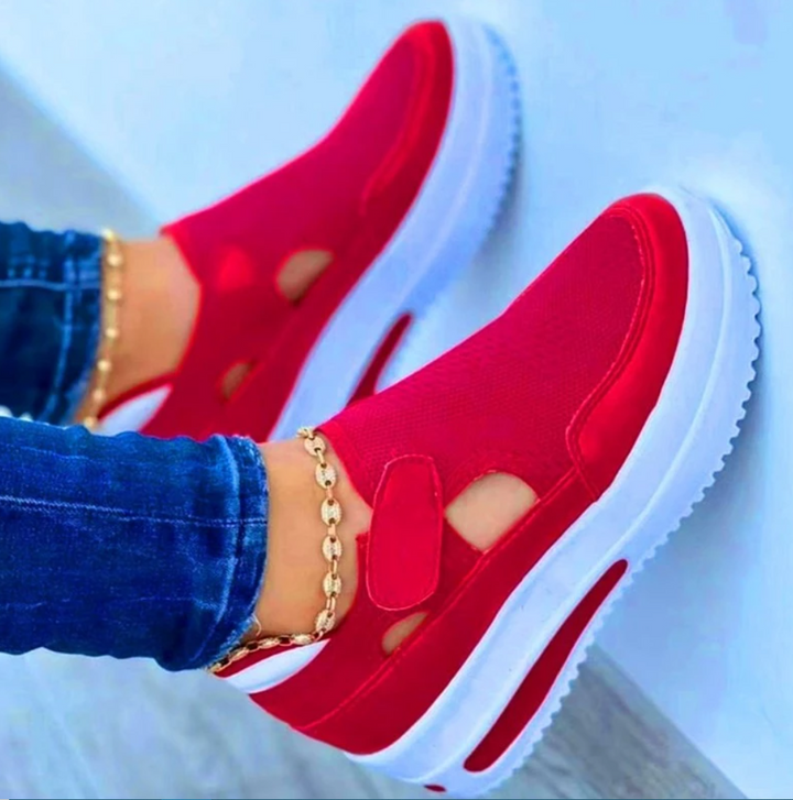 Comfortabele Trimmz™ dames sportschoenen met klittenband, verkrijgbaar in rood en zwart, modieus en praktisch.