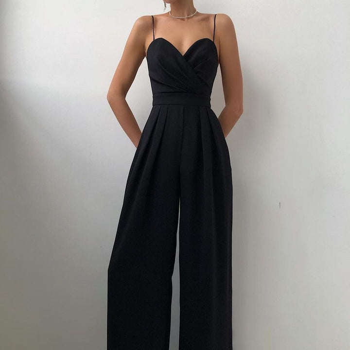 Modieuze dames jumpsuit met bandjes, wijd uitlopende pijpen, in Abrikoos, Geel, Roze, Rozerood, Zwart, Turkoois.
