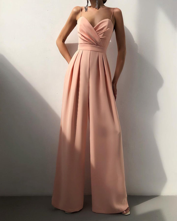 Modieuze dames jumpsuit met bandjes, wijd uitlopende pijpen, in Abrikoos, Geel, Roze, Rozerood, Zwart, Turkoois.