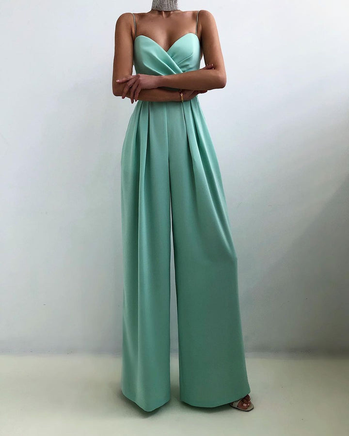 Modieuze dames jumpsuit met bandjes, wijd uitlopende pijpen, in Abrikoos, Geel, Roze, Rozerood, Zwart, Turkoois.