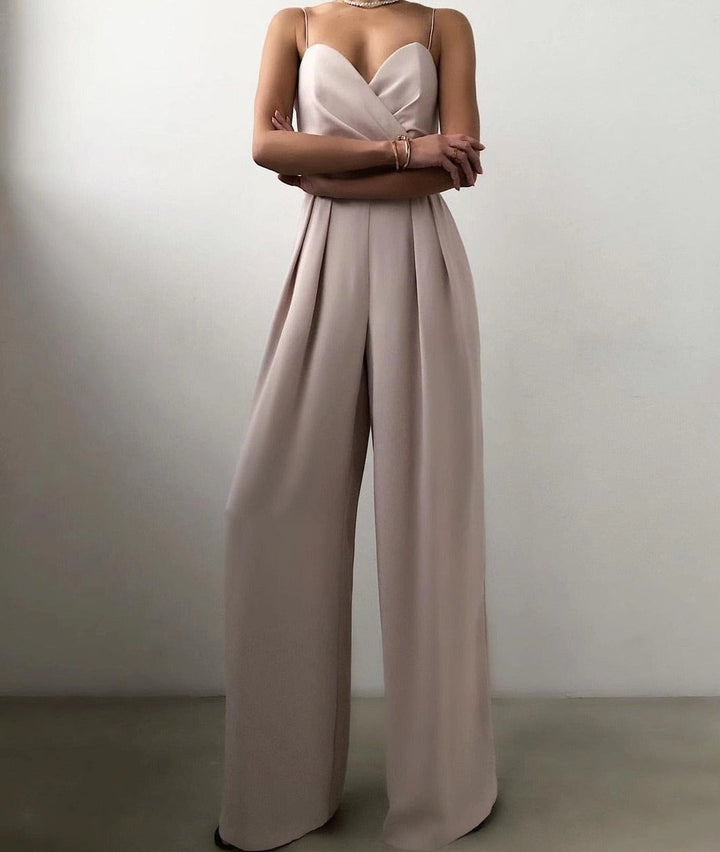Modieuze dames jumpsuit met bandjes, wijd uitlopende pijpen, in Abrikoos, Geel, Roze, Rozerood, Zwart, Turkoois.