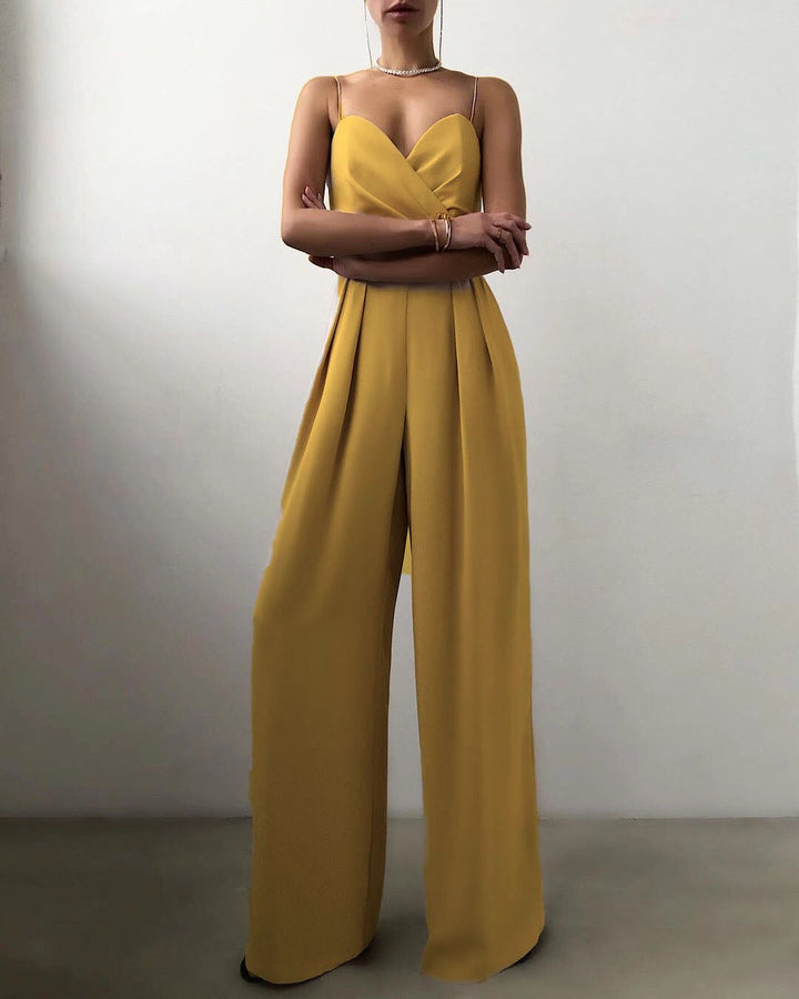 Modieuze dames jumpsuit met bandjes, wijd uitlopende pijpen, in Abrikoos, Geel, Roze, Rozerood, Zwart, Turkoois.