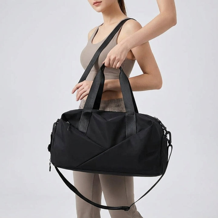 Movella duffeltas unisex, te dragen als schoudertas of handtas, met stevige ritsen voor reizen.