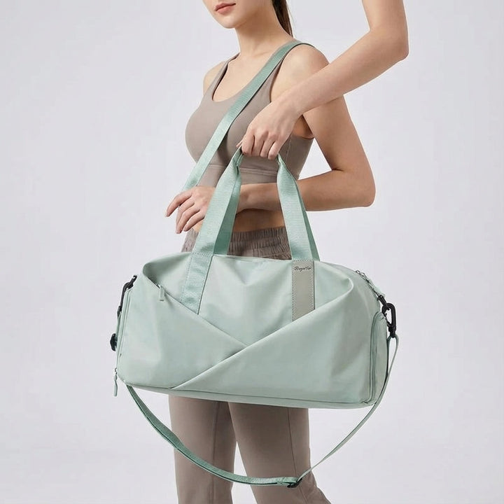 Stijlvolle Movella unisex duffeltas, perfect als reistas, gymtas of weekendtas, met comfortabele draagopties.