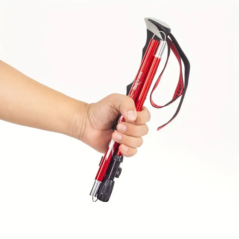 Compacte opvouwbare TrekPro wandelstok, een essentieel verstelbaar hulpmiddel voor outdoor avonturen.