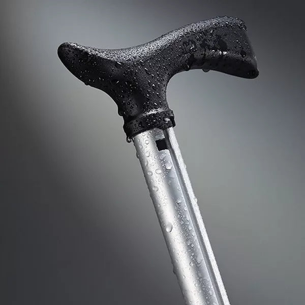 Compacte opvouwbare wandelstok met ingebouwd zitje, perfect voor reizen en outdoor gebruik, biedt steun.