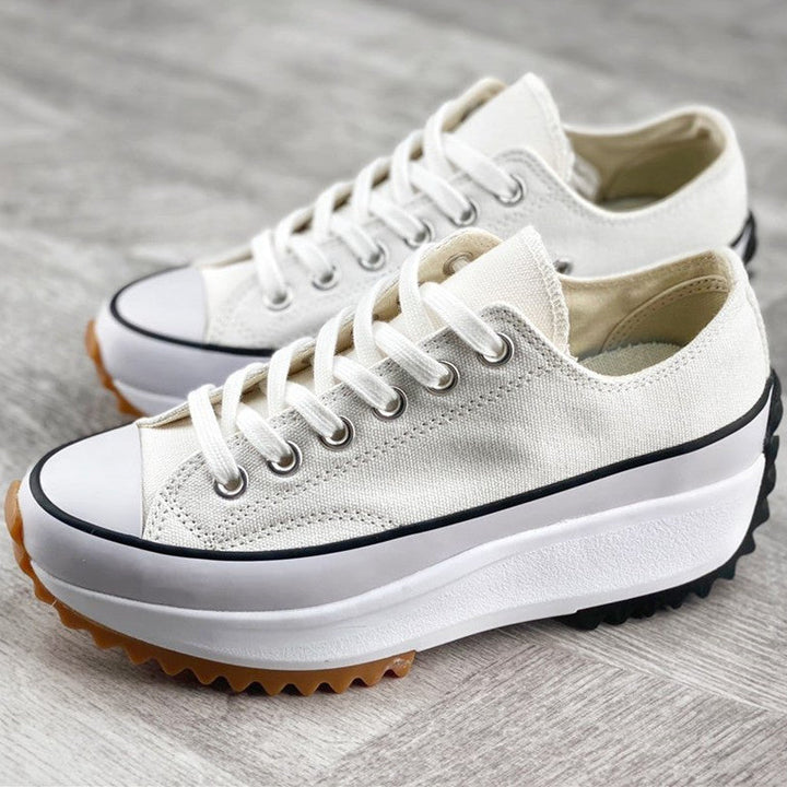 Witte orthopedische platformsneakers voor dames, stijlvol met verhoogd ontwerp en stevige zool voor comfort en mode.