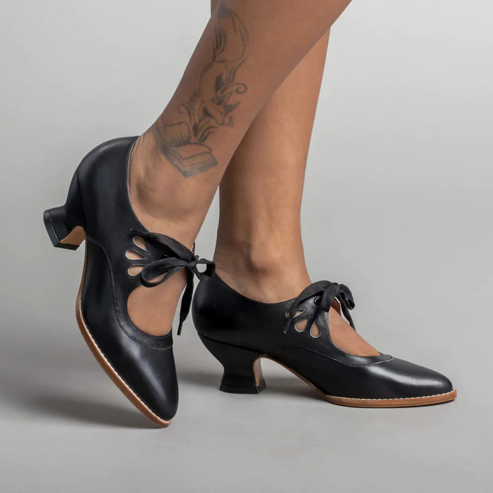 Orthopedische damesschoenen, elegant, hoge hak, modern design, zwart, met antislipzool voor comfort en stabiliteit.