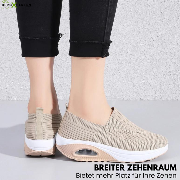 Orthopedische damesschoenen met antislipzool, ademend materiaal en ruime teenruimte, zijaanzicht.