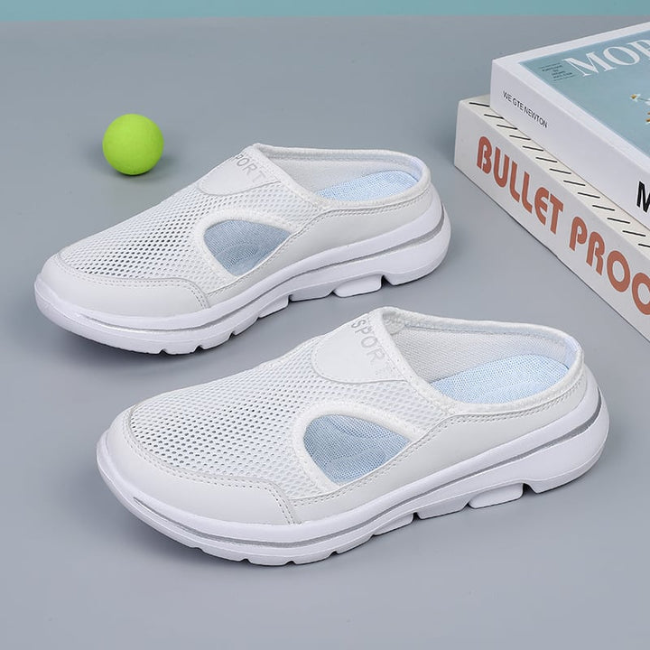 Orthopedische herenpantoffels met dempende binnenzool en ademend mesh in stijlvol halfopen ontwerp.