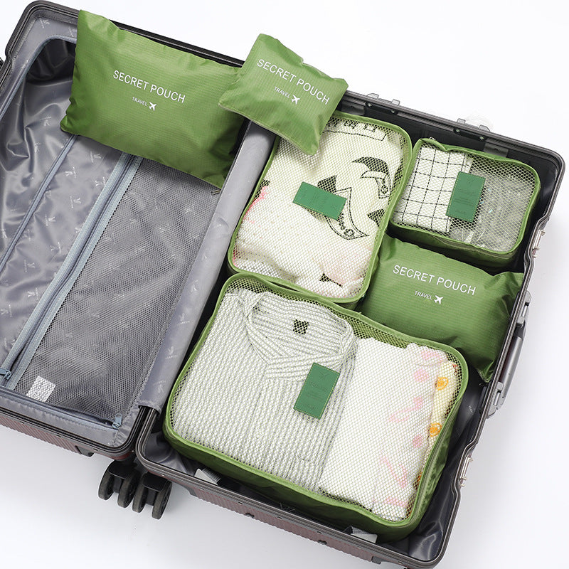 Georganiseerde reisset met stevige inpakblokjes, essentieel voor een overzichtelijke en stressvrije vakantie.