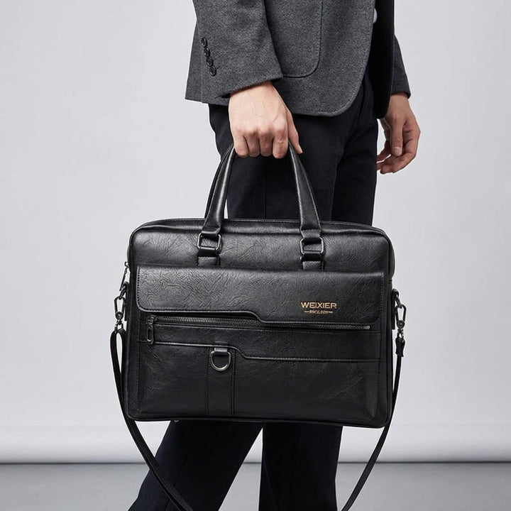 Zwarte PU lederen schoudertas MetroBrief met verstelbare band, perfect voor pendelen en als professionele reistas.