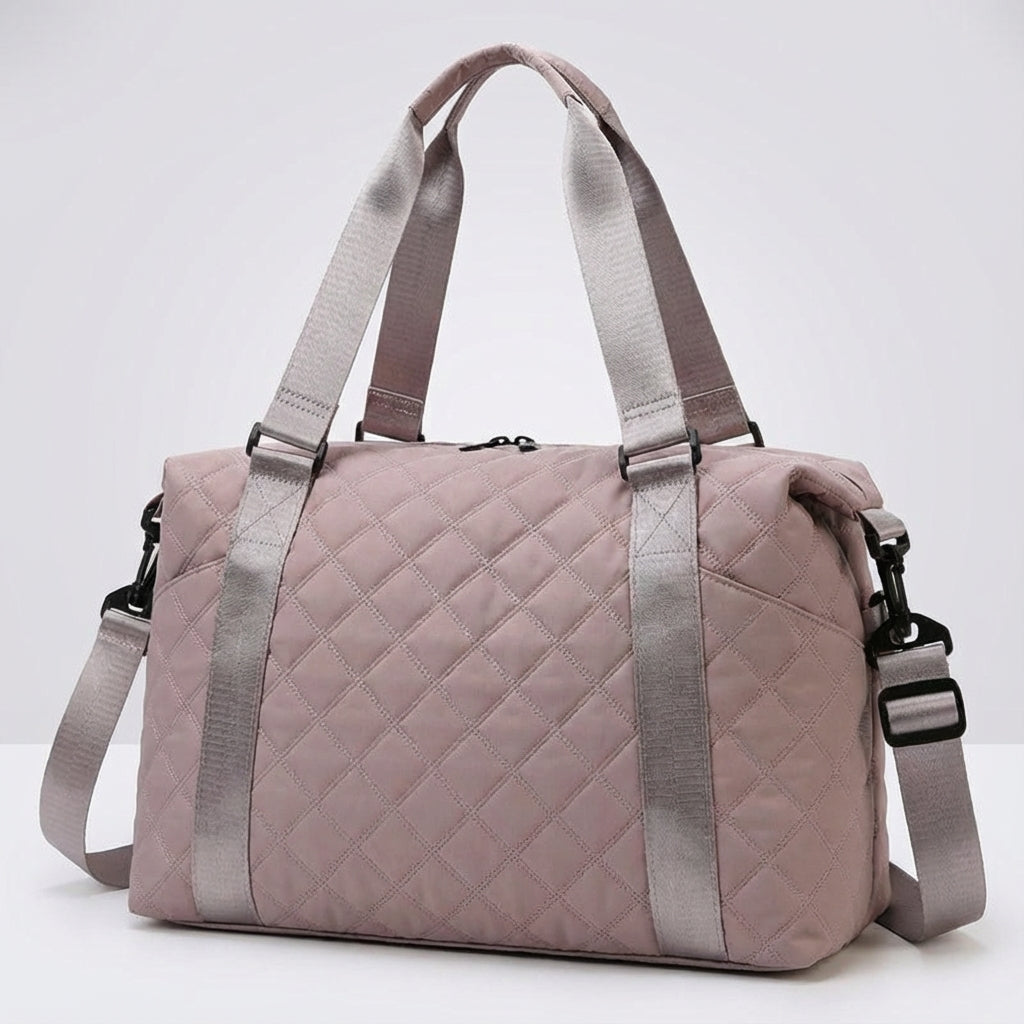 Functionele unisex sporttas/reistas. Deze gewatteerde duffel is ideaal voor het weekend en dagelijks gebruik.