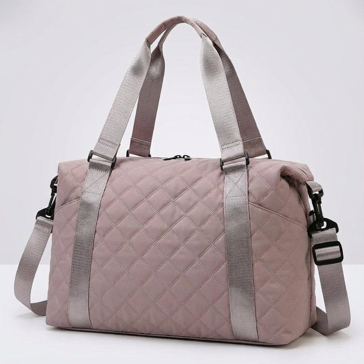 Functionele unisex sporttas/reistas. Deze gewatteerde duffel is ideaal voor het weekend en dagelijks gebruik.