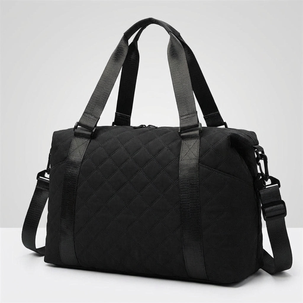 Quiltiva gewatteerde weekendtas: een ruime en trendy duffel. Perfect als handbagage en reistas voor unisex gebruik.