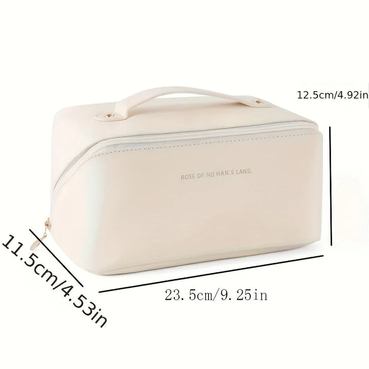 Reisvriendelijke cosmetica tas in roze, compact en elegant, met praktisch handvat en veelzijdige interne indeling