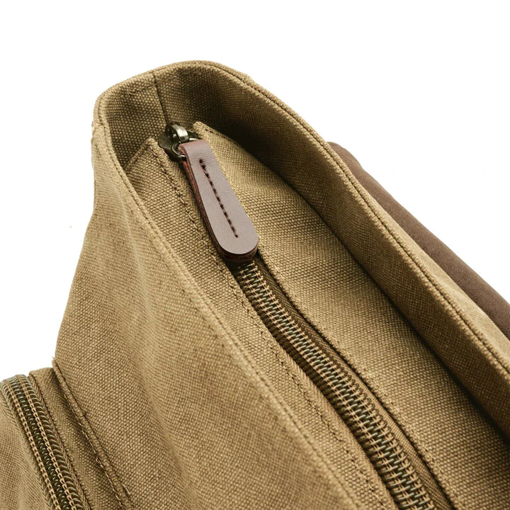 Dagelijkse tas voor mannen: stevige canvas crossbody met ruime opbergruimte en brede riem.