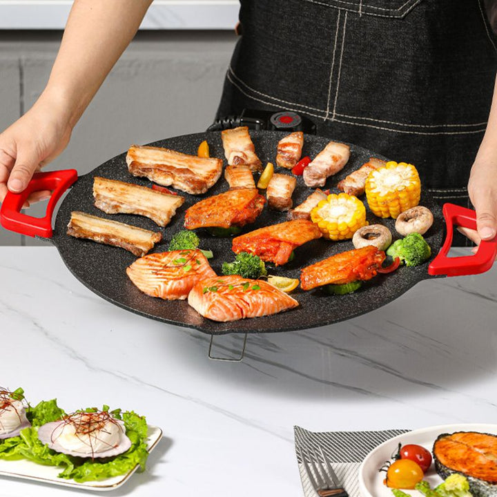 Heerlijk eten bereiden met de EzGrill rookvrije elektrische grillplaat; ideaal voor vlees, vis en groenten.
