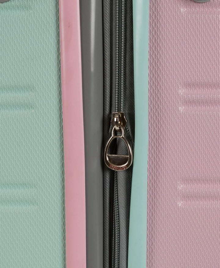 Zijaanzicht van de "Cotton Candy" lichtgewicht hardcase carry-on met dubbele 360° spinnerwielen. Handbagage.