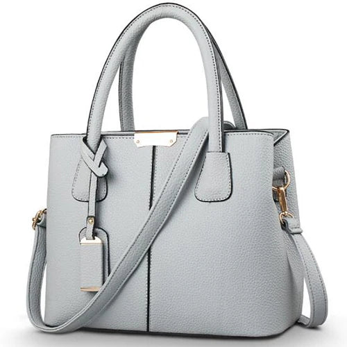Zwarte dames crossbody tas van kunstleer, elegant en ruim, voor stijlvolle vrouwen in het dagelijks leven en bij gelegenheden.