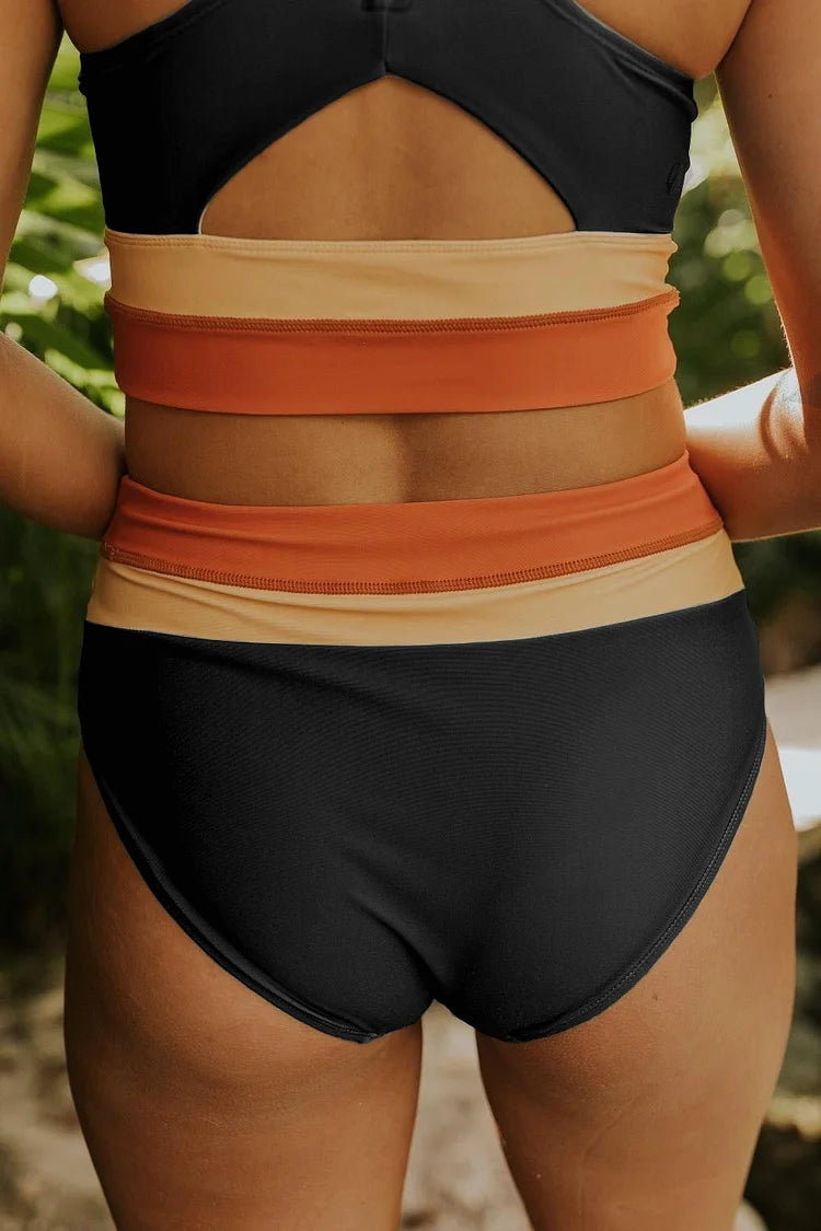 Schwarzes Colorblock Bikini-Set mit Kreuz-Design, elegantes Schwimmoutfit mit Kontrastfarben für Strand und Pool.
