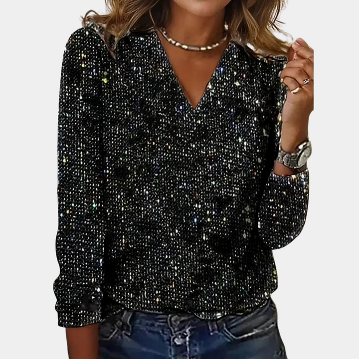 Elegant zwart glittertopje met fonkelende pailletten en V-hals, ideaal voor een stijlvolle avond of speciale gelegenheden.