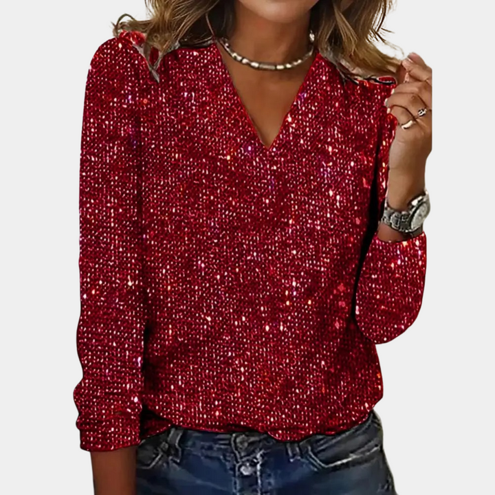 Elegant zwart glittertopje met fonkelende pailletten en V-hals, ideaal voor een stijlvolle avond of speciale gelegenheden.