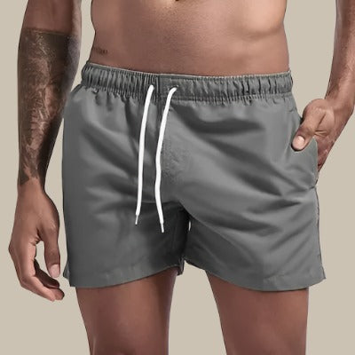 Deze herenzwemshort droogt snel; comfortabel en stijlvol voor vakantie, zwemmen en ontspanning op het strand.