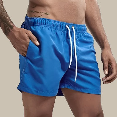 Mannen zwemshort die snel droogt; perfecte strandkleding voor een actieve en stijlvolle vakantie.