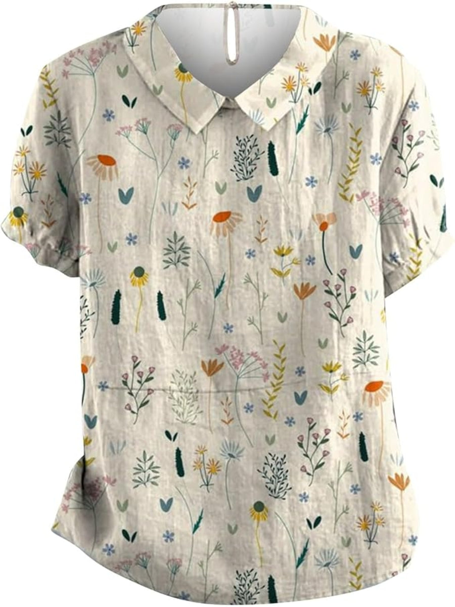 Zomerblouse met wilde bloemenprint, pastelkleurig, losvallend, ideaal voor warme dagen; damesmode, stijlvol en comfortabel.