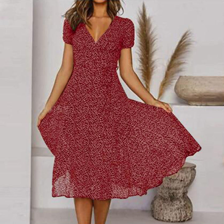 Zomerjurk met bloemenprint, A-lijn, V-hals, elegant, licht en ademend voor zonnige dagen.