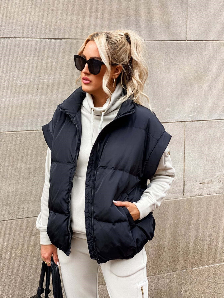 Warm gewatteerd puffer vest voor dames, ideaal voor herfst/winter. Trendy en comfortabel mouwloos design.