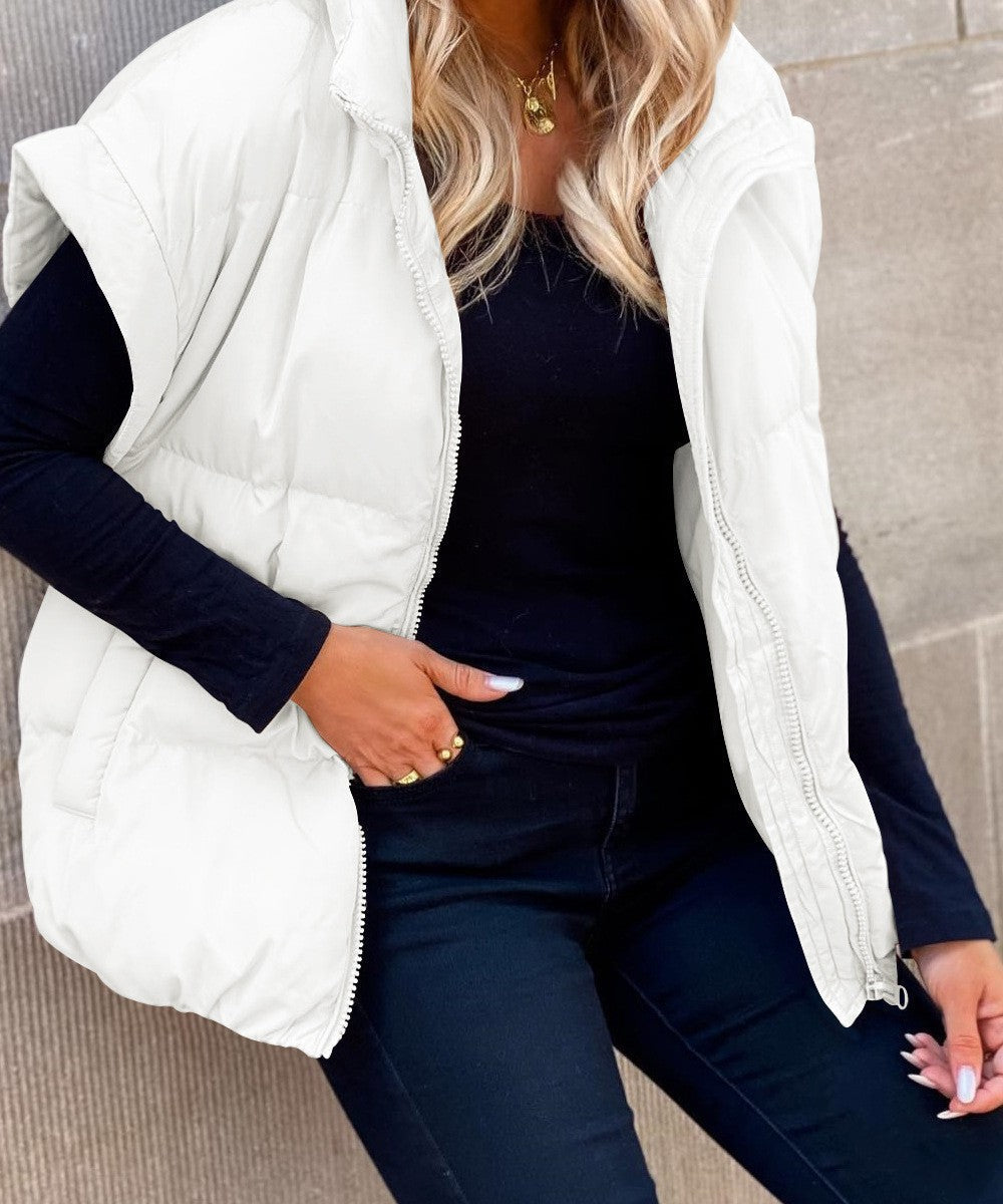 Veelzijdig dames gewatteerd vest. Warm puffer model, mouwloos en stijlvol voor zowel casual als geklede looks.