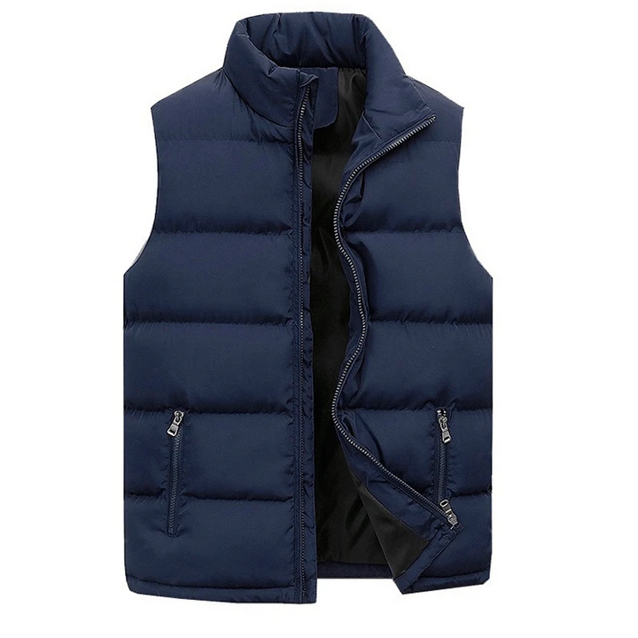 Zwart gewatteerd heren gilet, perfect als warme bovenkleding of mouwloos jack voor casual herenmode. Met ritssluiting.