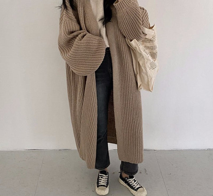 Stijlvol khaki gebreid MollysVest damesvest, perfect voor comfort en warmte in de winter.