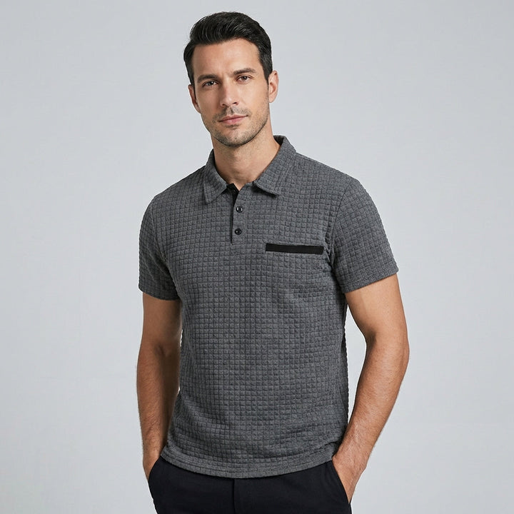 Heren slim-fit poloshirt met korte mouwen, stijlvol en comfortabel, geschikt voor casual en nette gelegenheden.