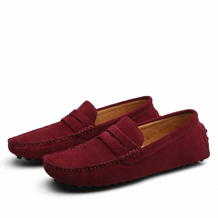 Marineblauwe heren loafers, comfortabel en perfect voor zowel casual als formele outfits.