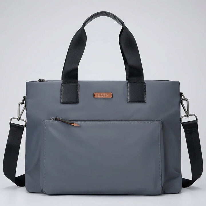 Detail van de stevige canvas stof en ritssluiting van de MetroBrief laptoptas. Duurzame en functionele aktetas.