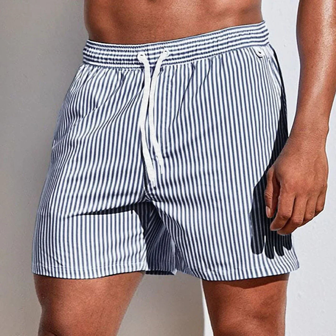Comfortabele, sneldrogende heren boardshort van polyester, perfect voor strand en zwembad.