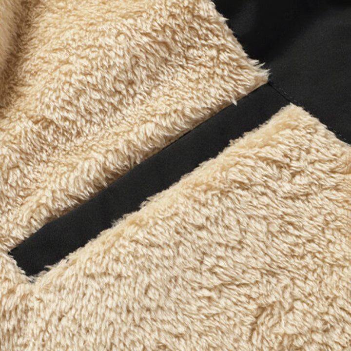 Zachte en warme heren bodywarmer met stijlvolle bont afwerking, ideaal voor comfortabele herfstmode.