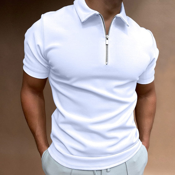 Comfortabele heren ritspolo in effen kleur met kraag. Perfect voor een moderne casual stijl.