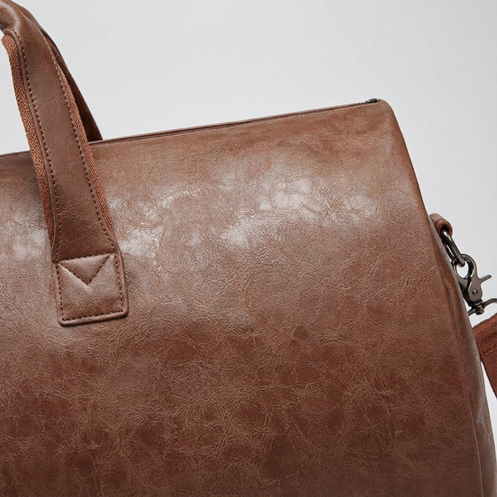 Duurzame Journeo weekendtas in zwart, een ruime en stijlvolle uniseks duffelbag voor al je reizen.
