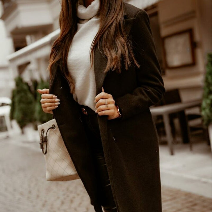 Elegante lange damesjas, ideaal als overgangsjas. Stijlvolle bovenkleding voor dames, geschikt voor vele outfits.