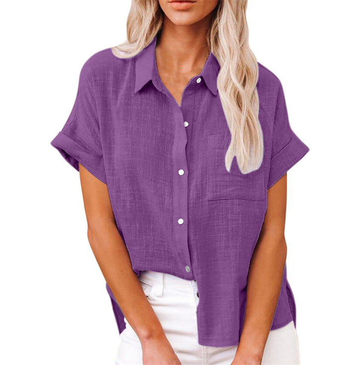 Effen damesblouse, netjes gevouwen. Losvallend, comfortabel en stijlvol met korte mouwen, ideaal als zomerblouse.