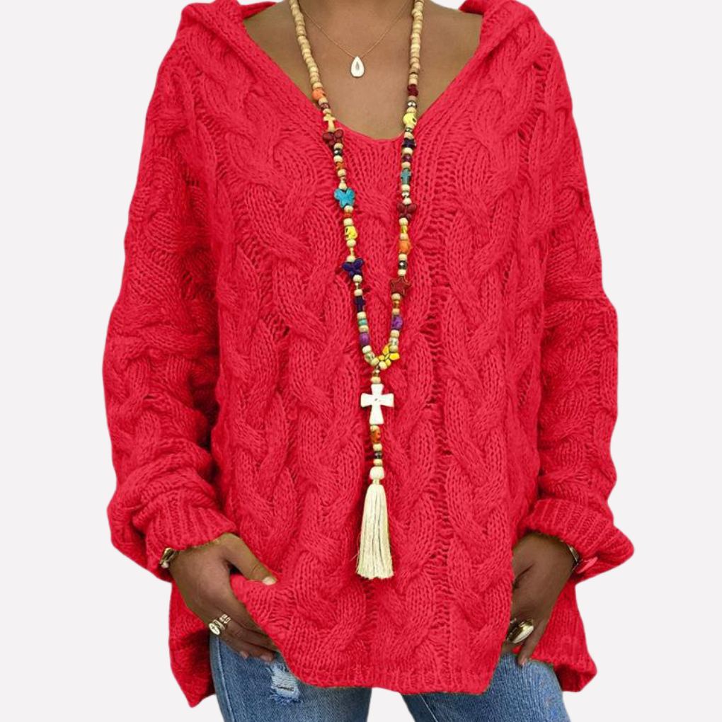 Modieuze dames oversized trui met chique kabelbreisel en v-hals. Een stijlvolle keuze voor herfst- en wintermode.