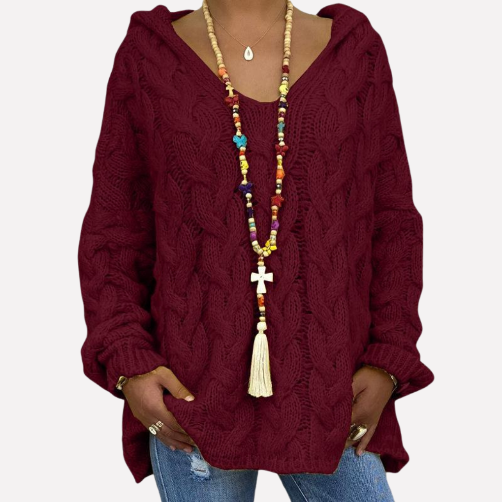Zachte polyester oversized dames trui met elegant kabelgebreid design en v-hals. Een must-have voor winterse comfortmode.