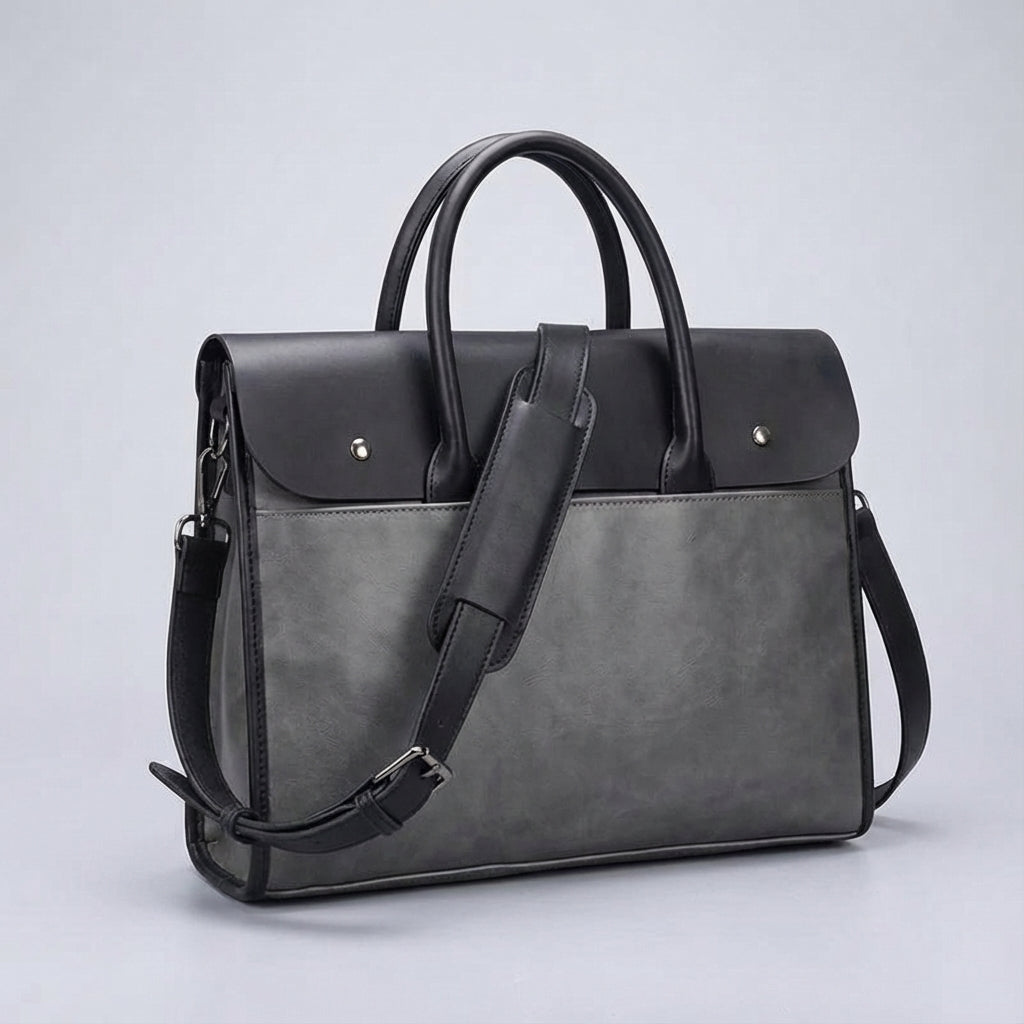 Heren laptoptas RetroCarry van hoogwaardig PU leer: beschermt je 14 inch laptop met stijl tijdens werk en reizen.
