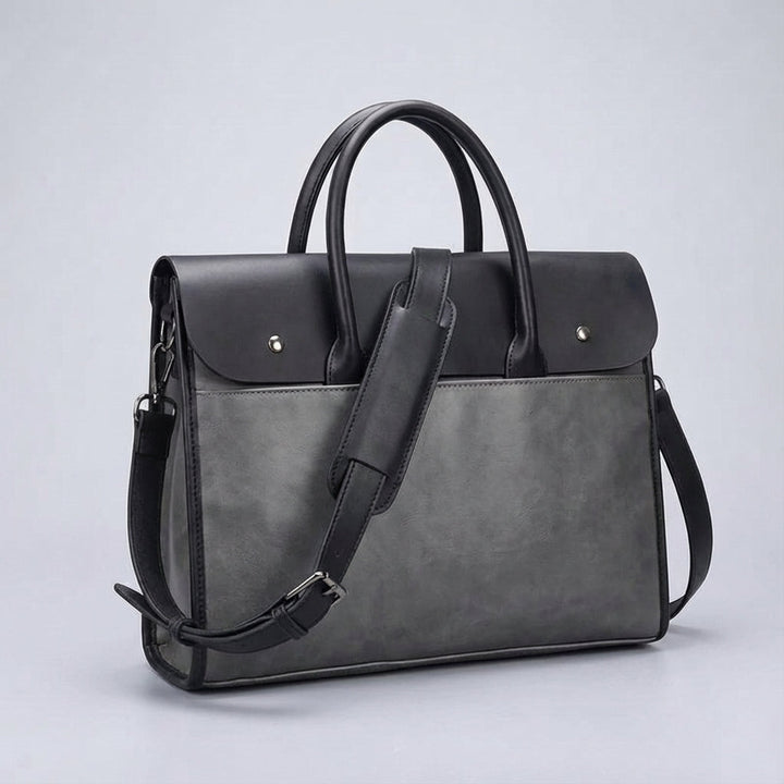 Heren laptoptas RetroCarry van hoogwaardig PU leer: beschermt je 14 inch laptop met stijl tijdens werk en reizen.