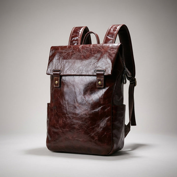 Moderne zwarte leren laptop rugzak, unisex en stijlvol, ideaal als kantoorrugzak of schooltas.